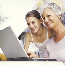 grandma and granddaughter downloading.