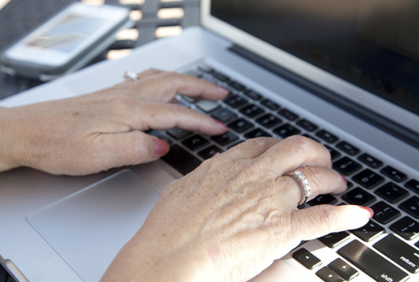 woman using her keyboard