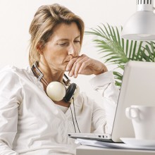 woman listening to music with headphones