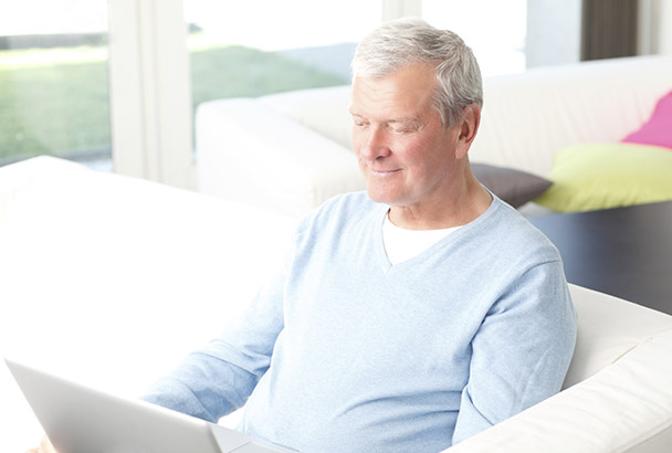 man removing old computer programs