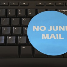 computer with no junk mail sticker on it