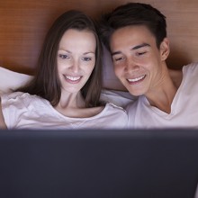 Couple Watching a Movie on computer.