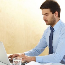 man checking his flight status